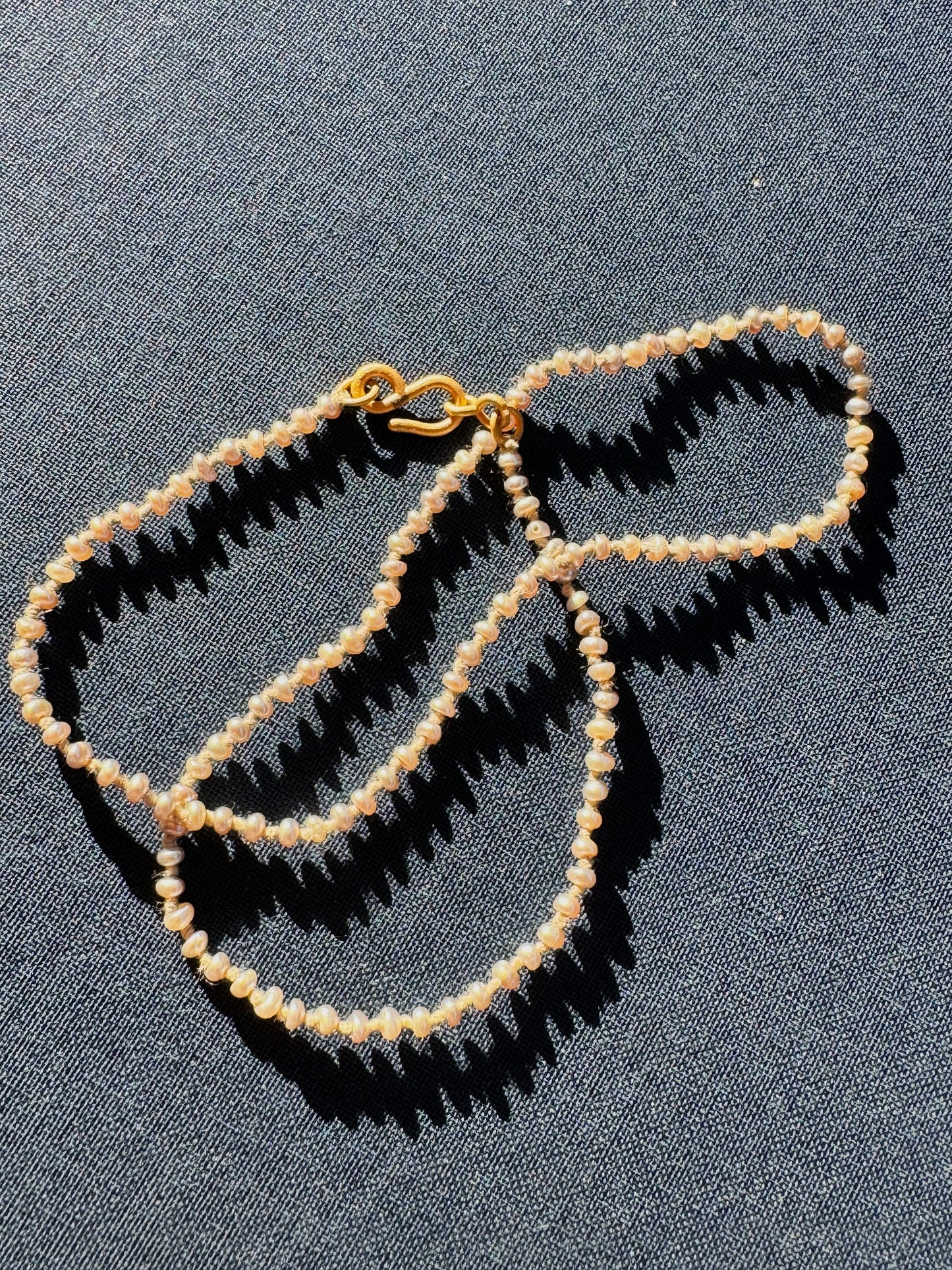 22k Small Grey Seed Pearl Strand